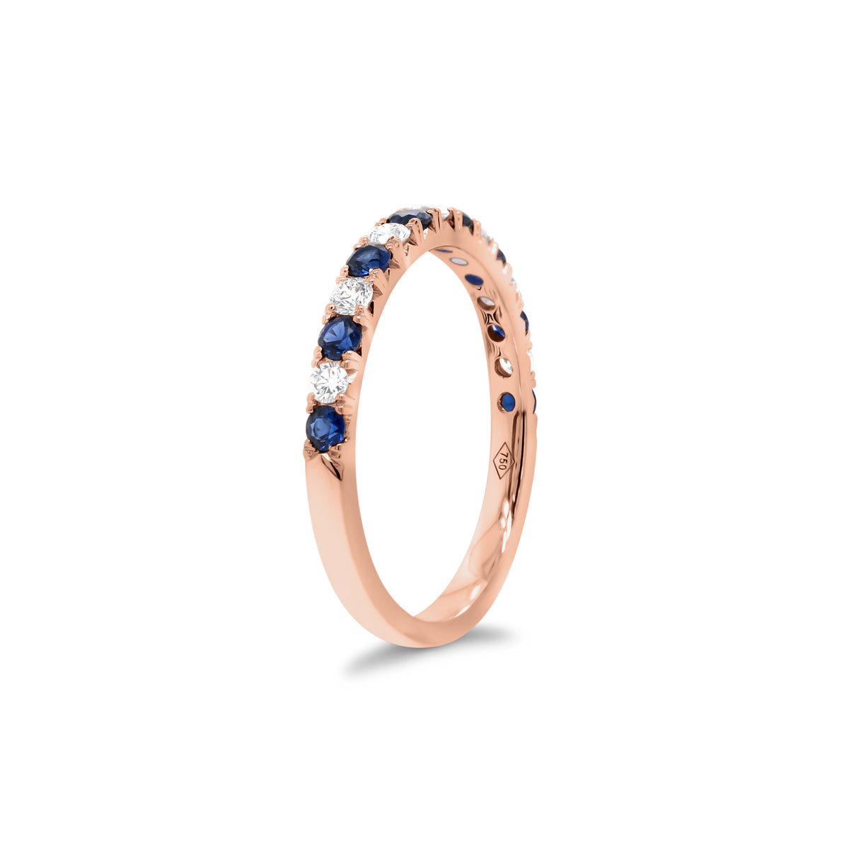 Sapphire & Diamond Band  - 18K gold weighing 2.0 grams  - 7 round diamonds totaling 0.22 carats  - 8 sapphires totaling 0.35 carats