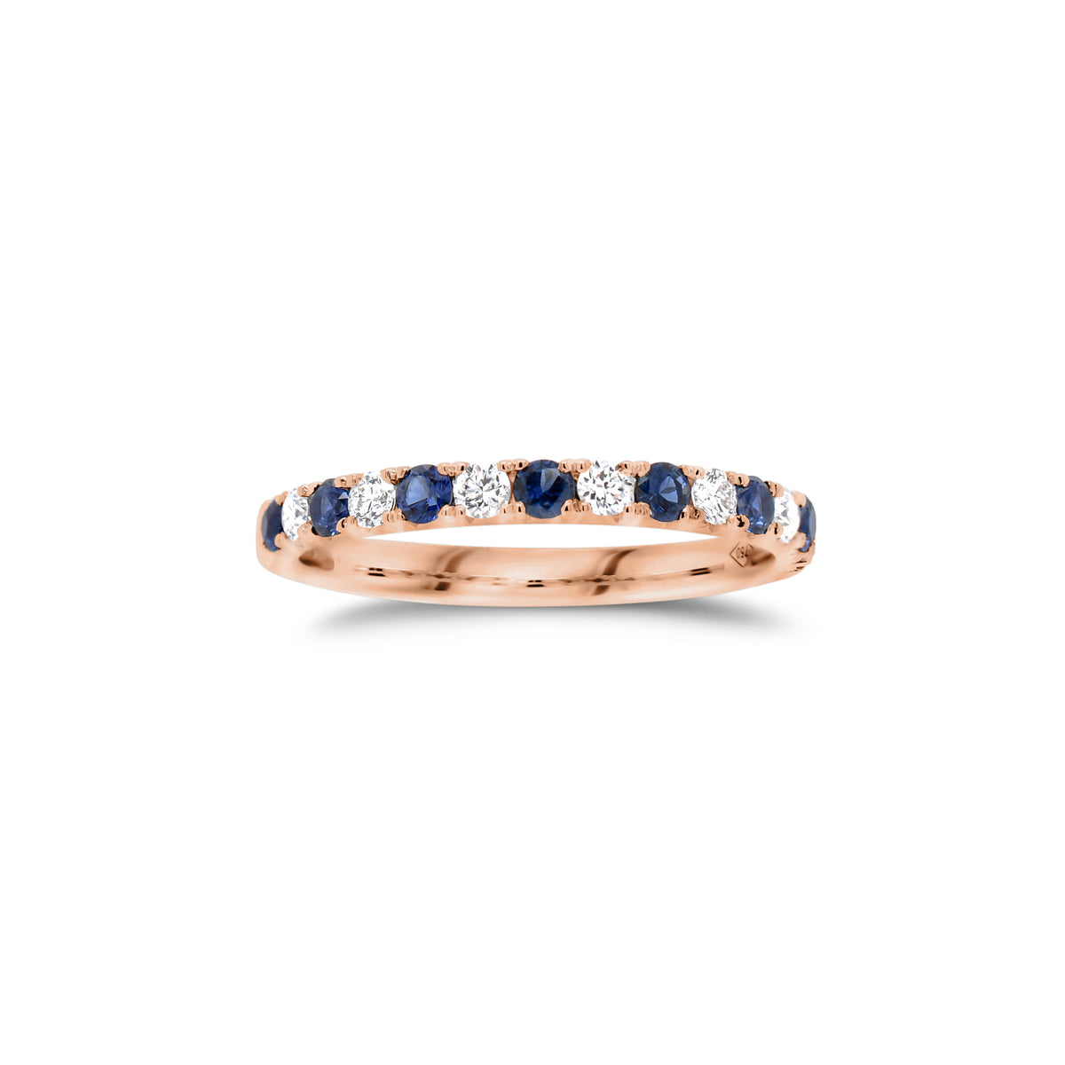Sapphire & Diamond Band  - 18K gold weighing 2.0 grams  - 7 round diamonds totaling 0.22 carats  - 8 sapphires totaling 0.35 carats