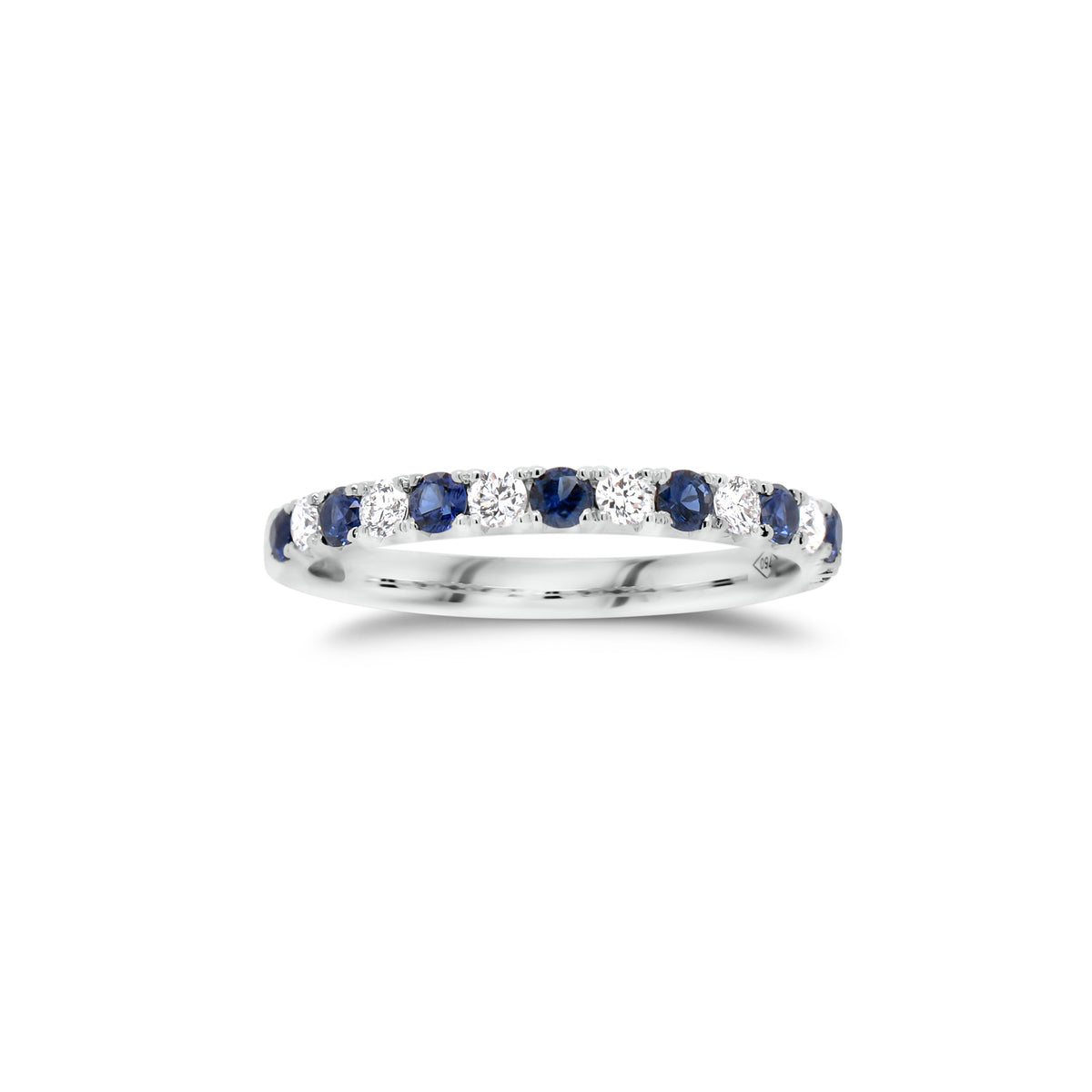 Sapphire & Diamond Band  - 18K gold weighing 2.0 grams  - 7 round diamonds totaling 0.22 carats  - 8 sapphires totaling 0.35 carats