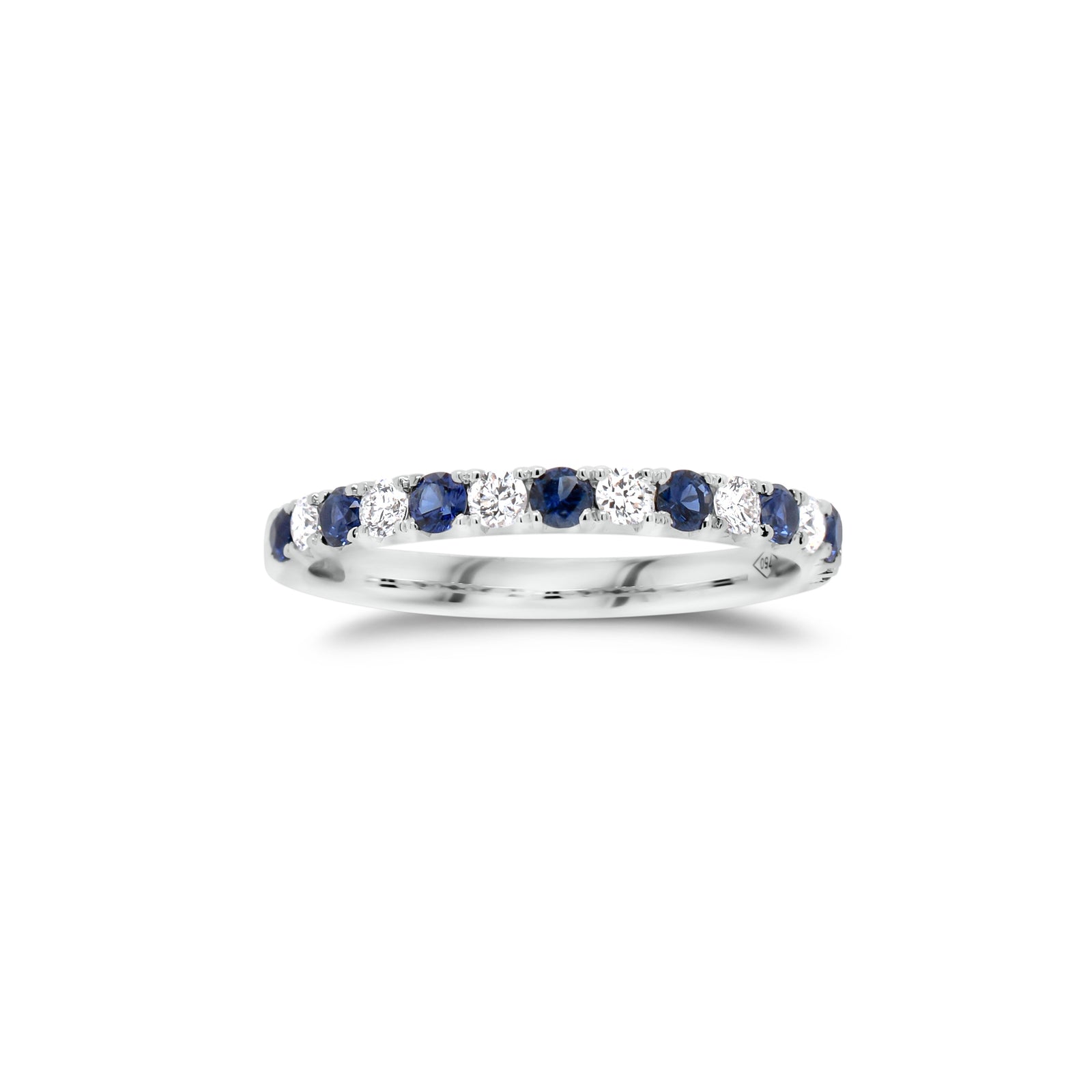 Sapphire & Diamond Band  - 18K gold weighing 2.0 grams  - 7 round diamonds totaling 0.22 carats  - 8 sapphires totaling 0.35 carats