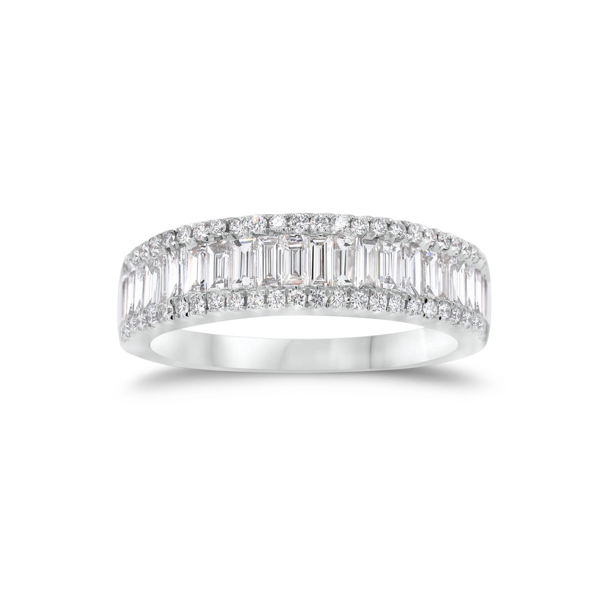 Baguette Diamond Wedding Band  - 18K gold weighing 5.41 grams  - 22 straight baguettes totaling 0.82 carats  - 54 round diamonds totaling 0.24 carats