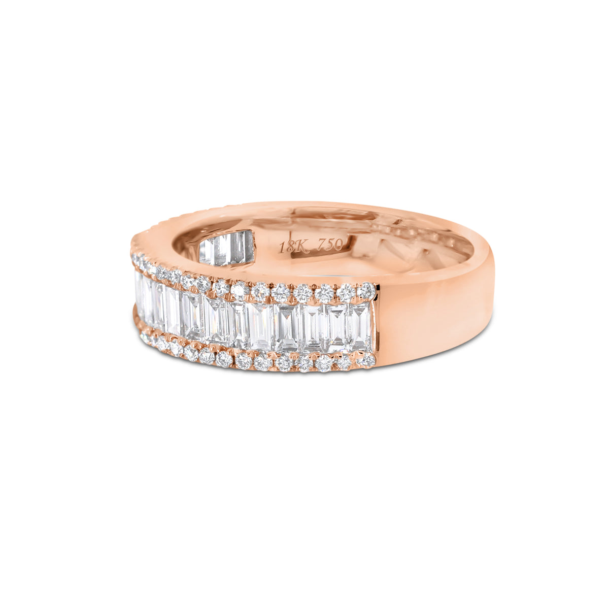 Baguette Diamond Wedding Band  - 18K gold weighing 5.41 grams  - 22 straight baguettes totaling 0.82 carats  - 54 round diamonds totaling 0.24 carats