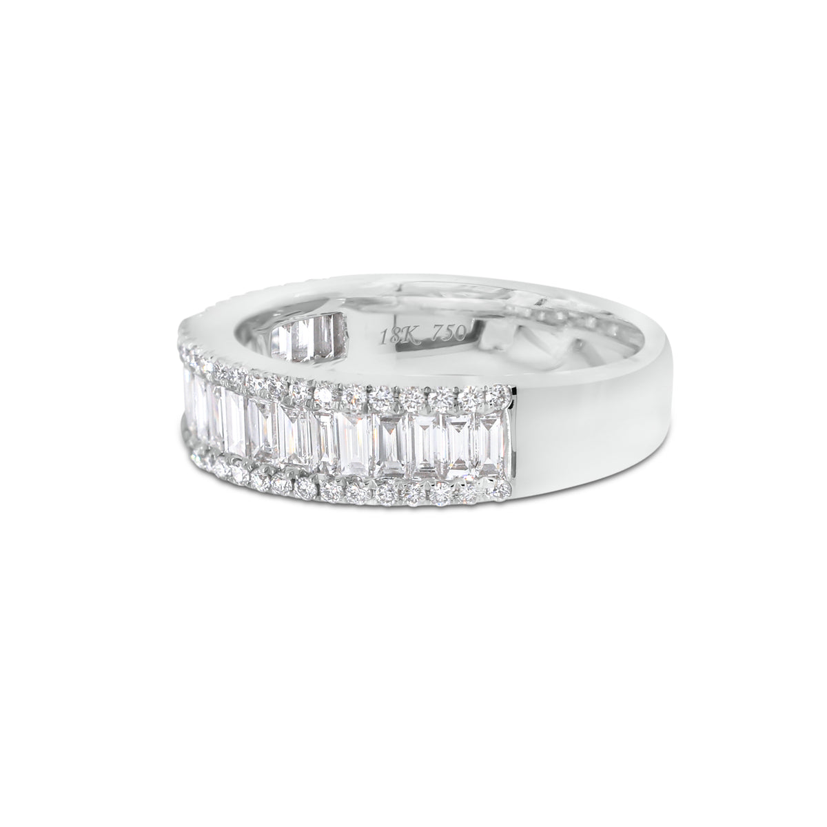 Baguette Diamond Wedding Band  - 18K gold weighing 5.41 grams  - 22 straight baguettes totaling 0.82 carats  - 54 round diamonds totaling 0.24 carats