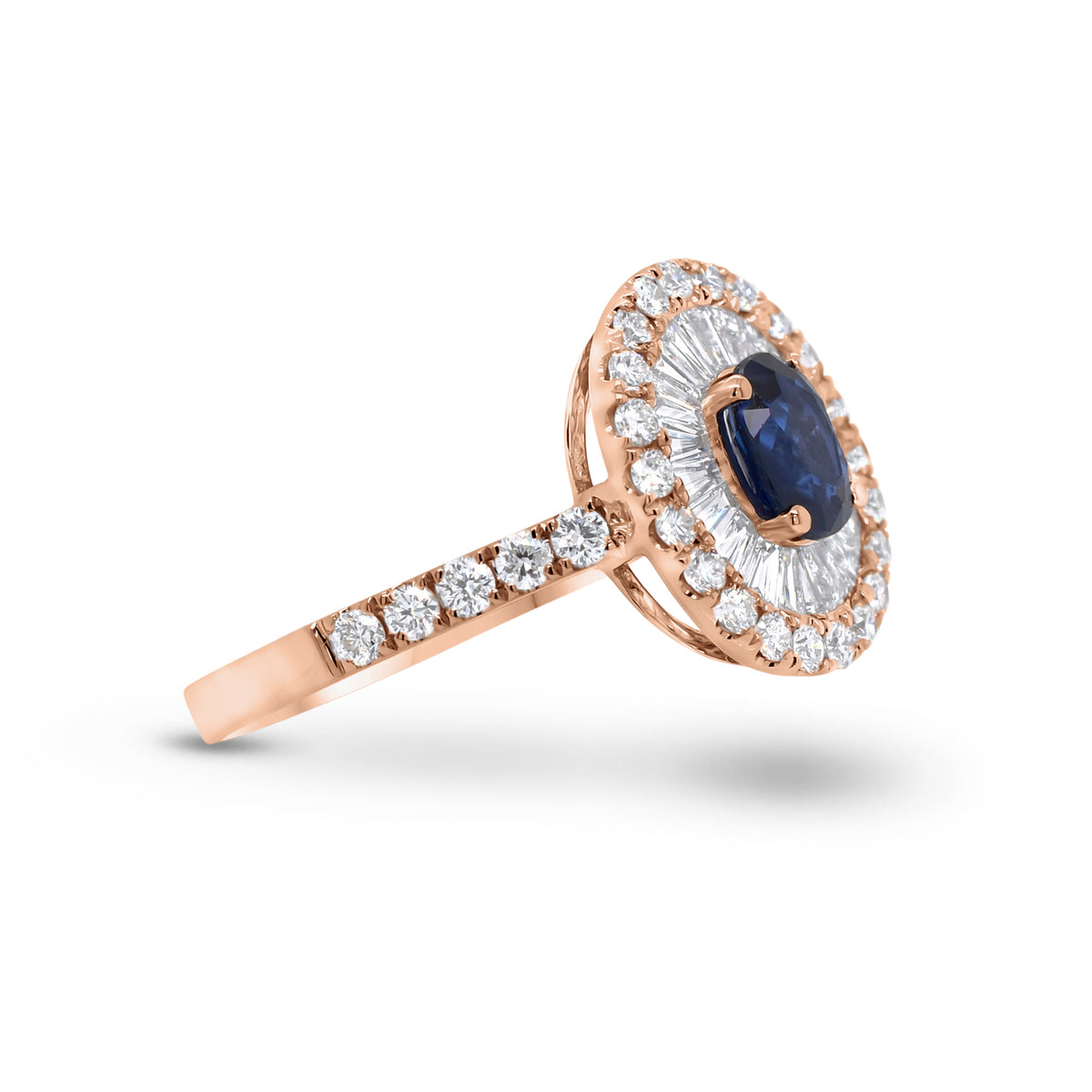 Sapphire double halo ring  - 18K gold weighing 3.88 grams  - 32 round diamonds totaling 0.55 carats  - 21 tapered baguettes totaling 0.51 carats  - 0.82 ct sapphire