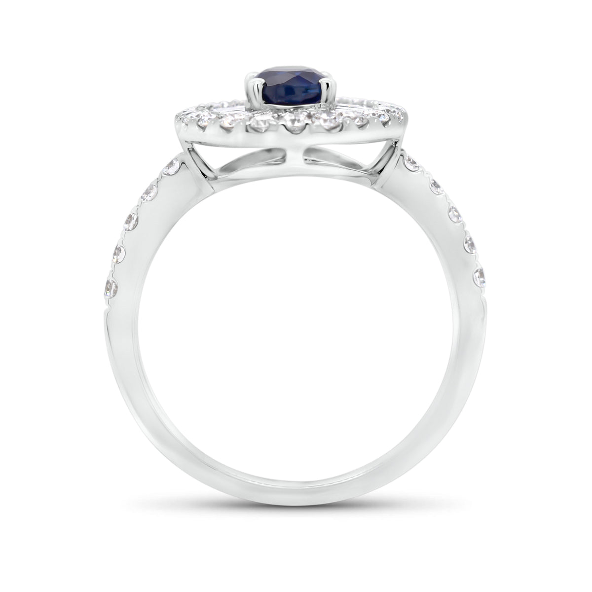 Sapphire double halo ring  - 18K gold weighing 3.88 grams  - 32 round diamonds totaling 0.55 carats  - 21 tapered baguettes totaling 0.51 carats  - 0.82 ct sapphire