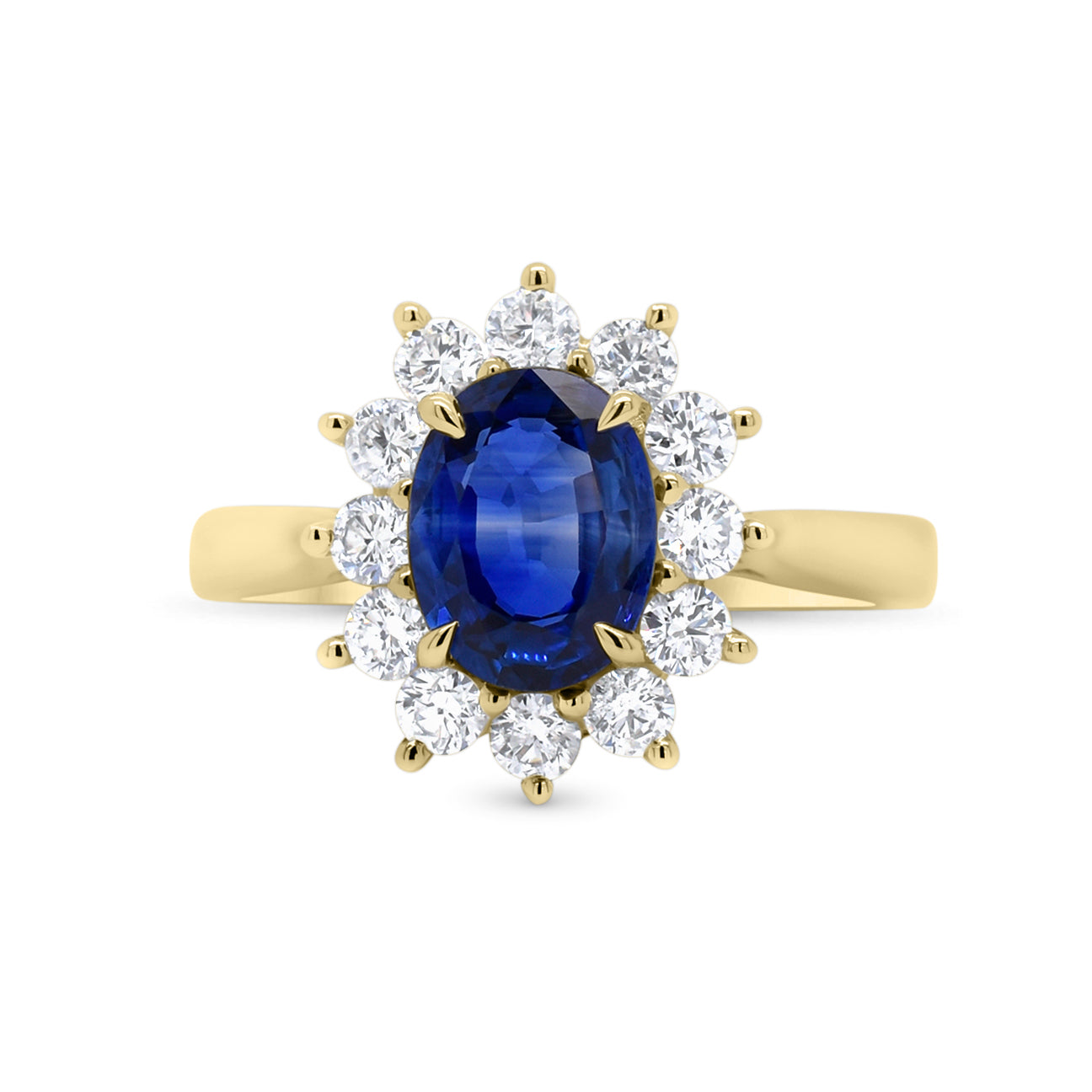 Sapphire & diamond classic ring - 18K gold weighing 3.32 grams  - 12 round diamonds totaling 0.58 carats  - 1.61 ct sapphire