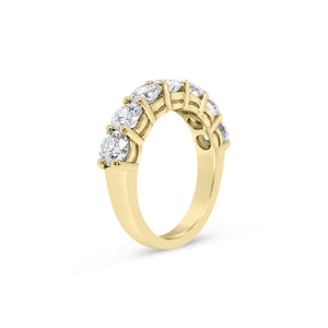7 Stone Diamond Wedding Band  -14k gold weighing 5.0 grams  -7 round shared prong-set diamonds weighing 2.35 carats