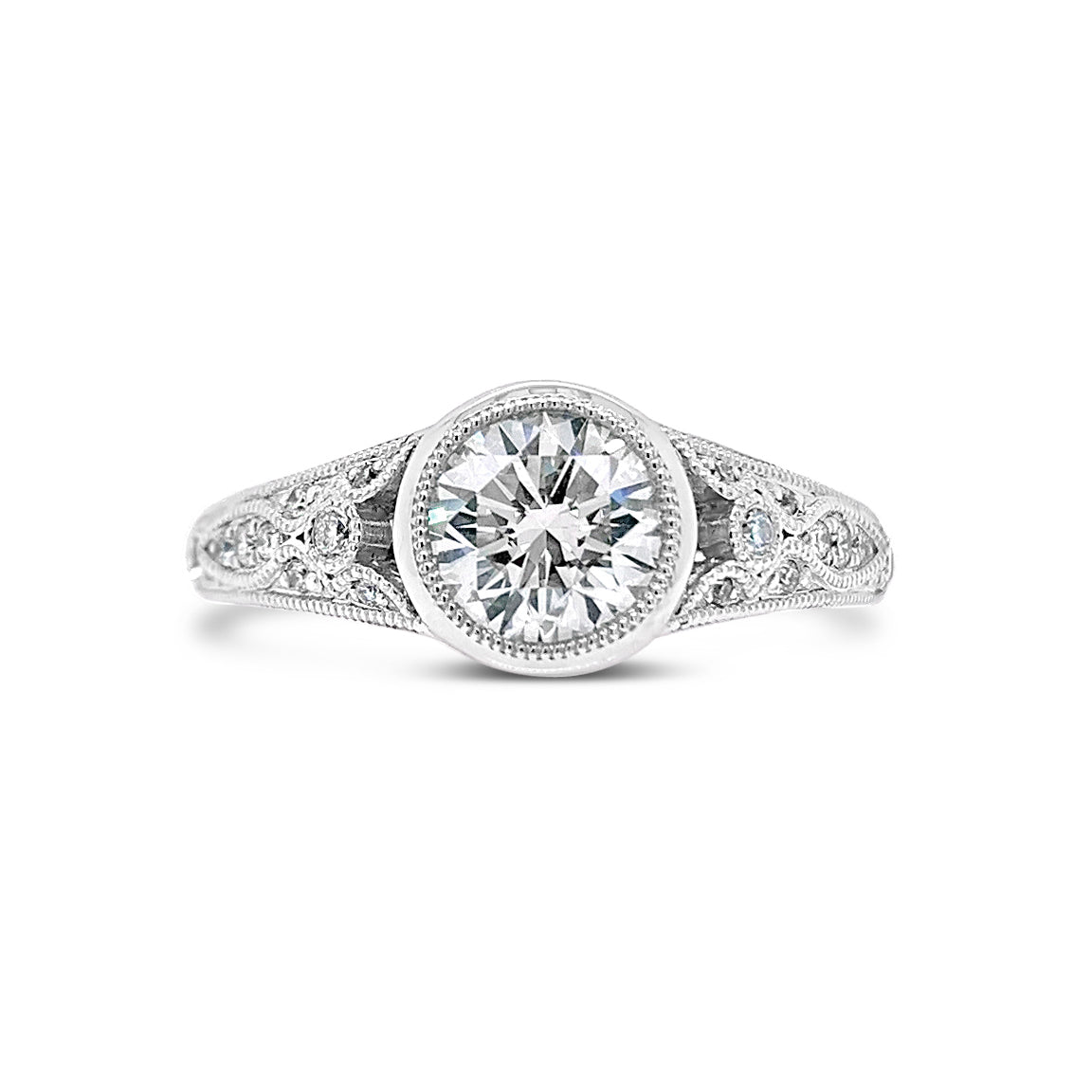 Bezel-Set Diamond Engagement Ring with Milgrain  - 18KT white gold weighting 3.90GR    - 60 round diamonds totaling 0.46 carats  - 1 Round Diamond totaling .92 GIA-G-VS1