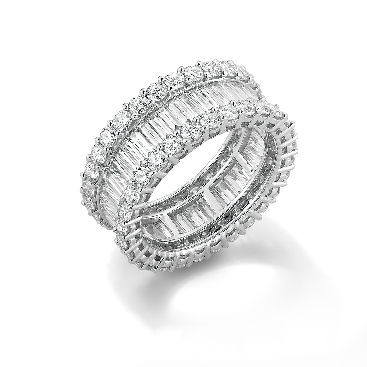 Baguette Eternity Band  18k gold, 5.07 grams, 58 round prong set brilliant diamonds 2.56 carats, 47 straight channel set baguettes 2.16 carats.