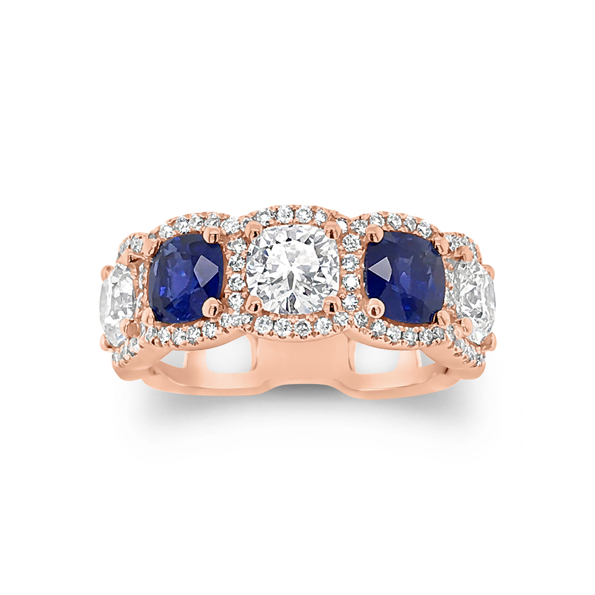 Cushion cut diamond and sapphire band -18k gold weighing 5.52 grams weighing  -84 round diamonds weighing .31 carats  -2 Sapphires -1.70cts  -3 Cushion cut diamonds - 1.56cts