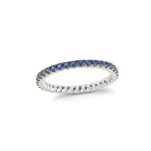 Blue Sapphire Eternity Ring  18k gold, 1.77 grams, 36 shared prong-set blue sapphires .78 carats.