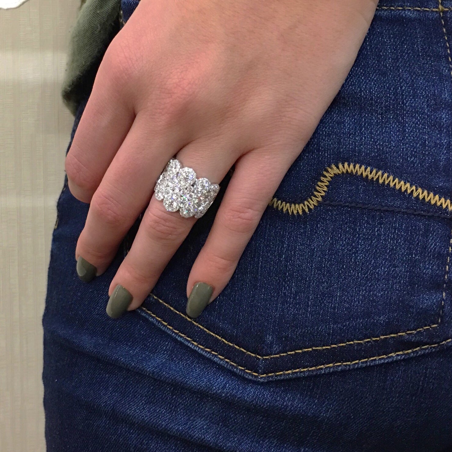 Diamond Cluster Ring  18k gold, 8.15 grams, 26 round shared prong-set diamonds 1.93 carats, 108 round shared prong-set diamonds 1.62 carats.  Total diamond weight 3.55 carats  Size 17 millimeters width