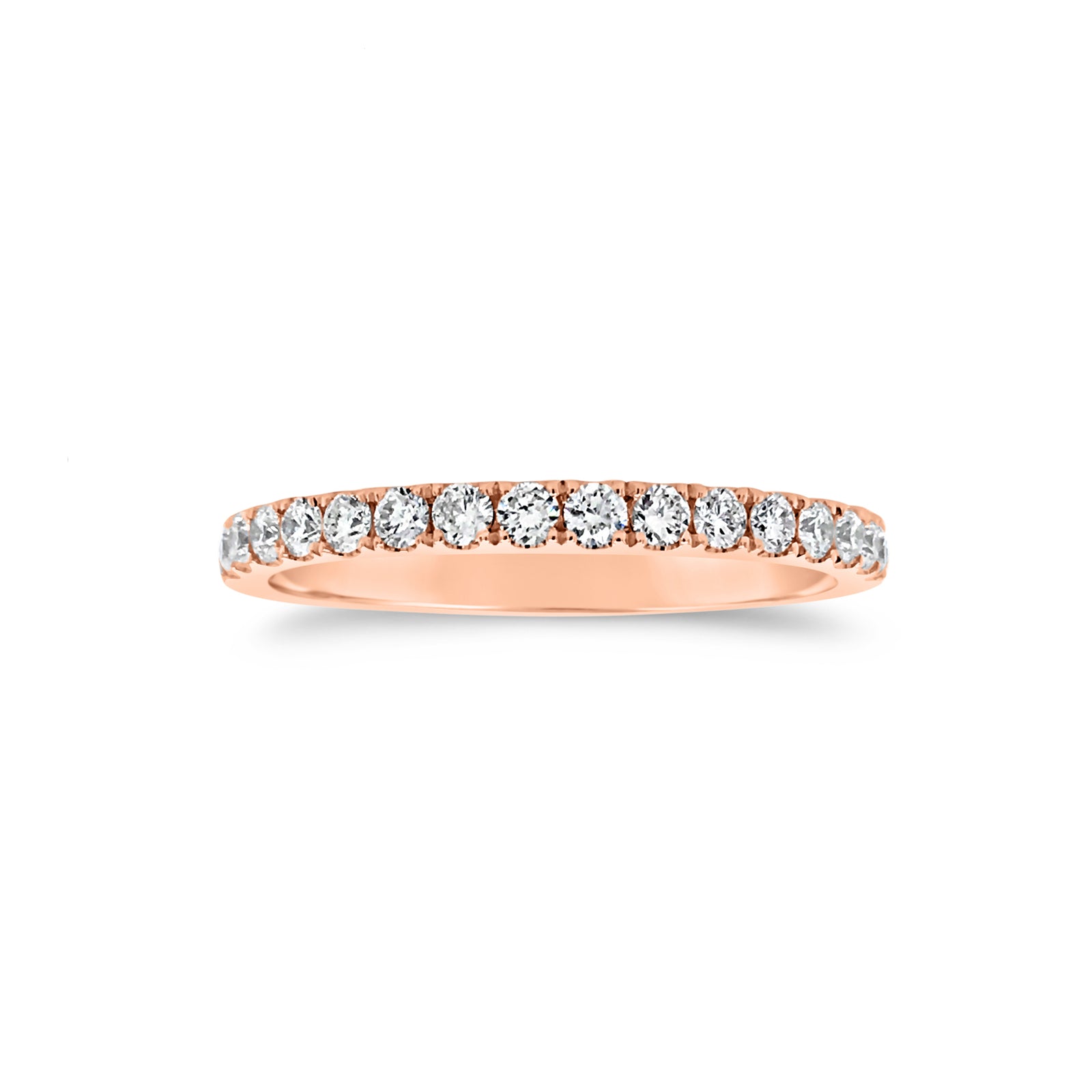 Slim Four Prong-Set Diamond Eternity Band  -18k gold weighing 1.60 grams  -34 round four prong-set diamonds weighing .71 carats