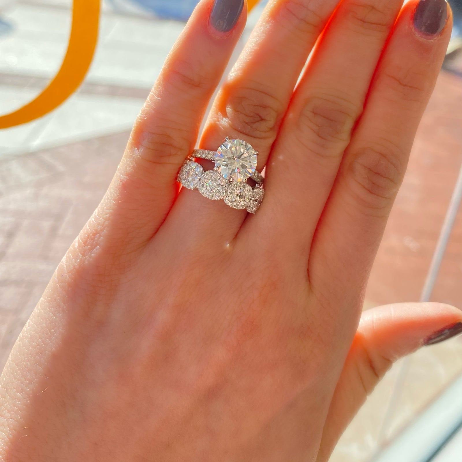 Square-Shaped Diamond Wedding Band  -18k gold weighing 3.47 grams  -40 round diamonds weighing .87 carats  -5 round diamonds weighing .55 carats