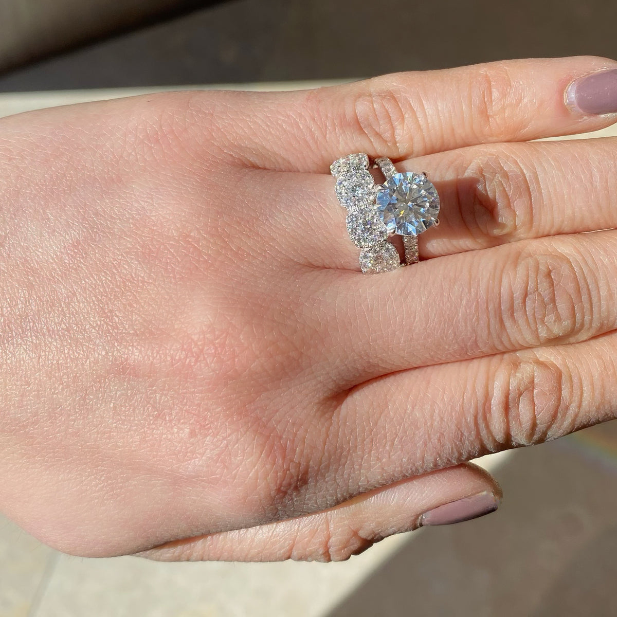 Square-Shaped Diamond Wedding Band  -18k gold weighing 3.47 grams  -40 round diamonds weighing .87 carats  -5 round diamonds weighing .55 carats