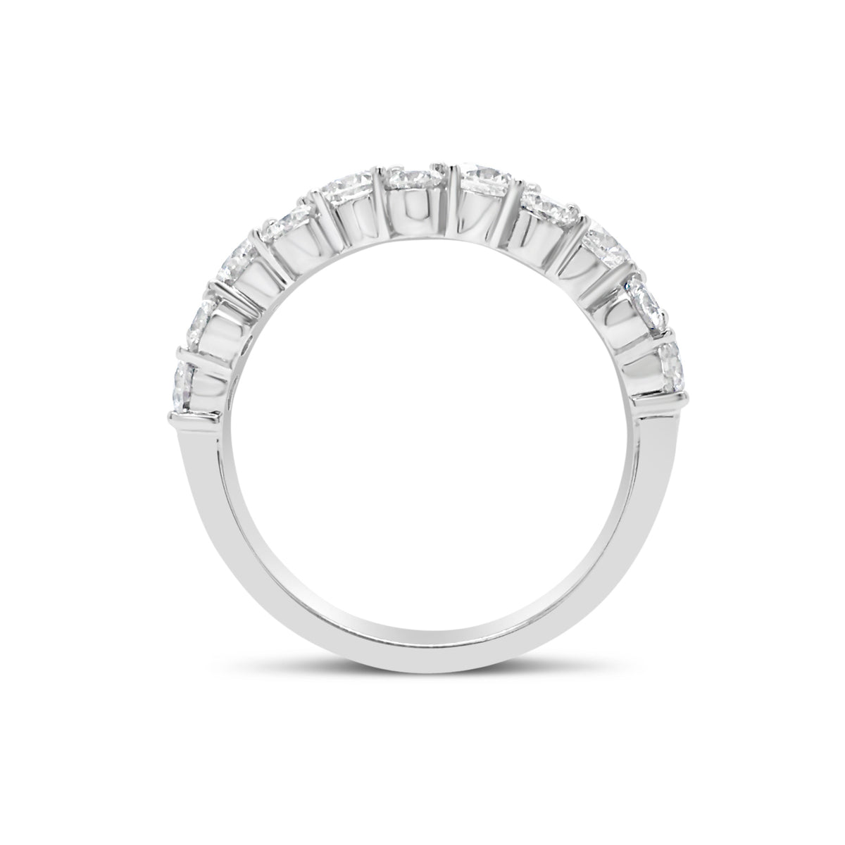 Prong-Set Diamond Staggered Wedding Band  -18k gold weighing 3.98 grams  -10 round diamonds weighing .80 carats  -6 round diamonds weighing 1.04 carats