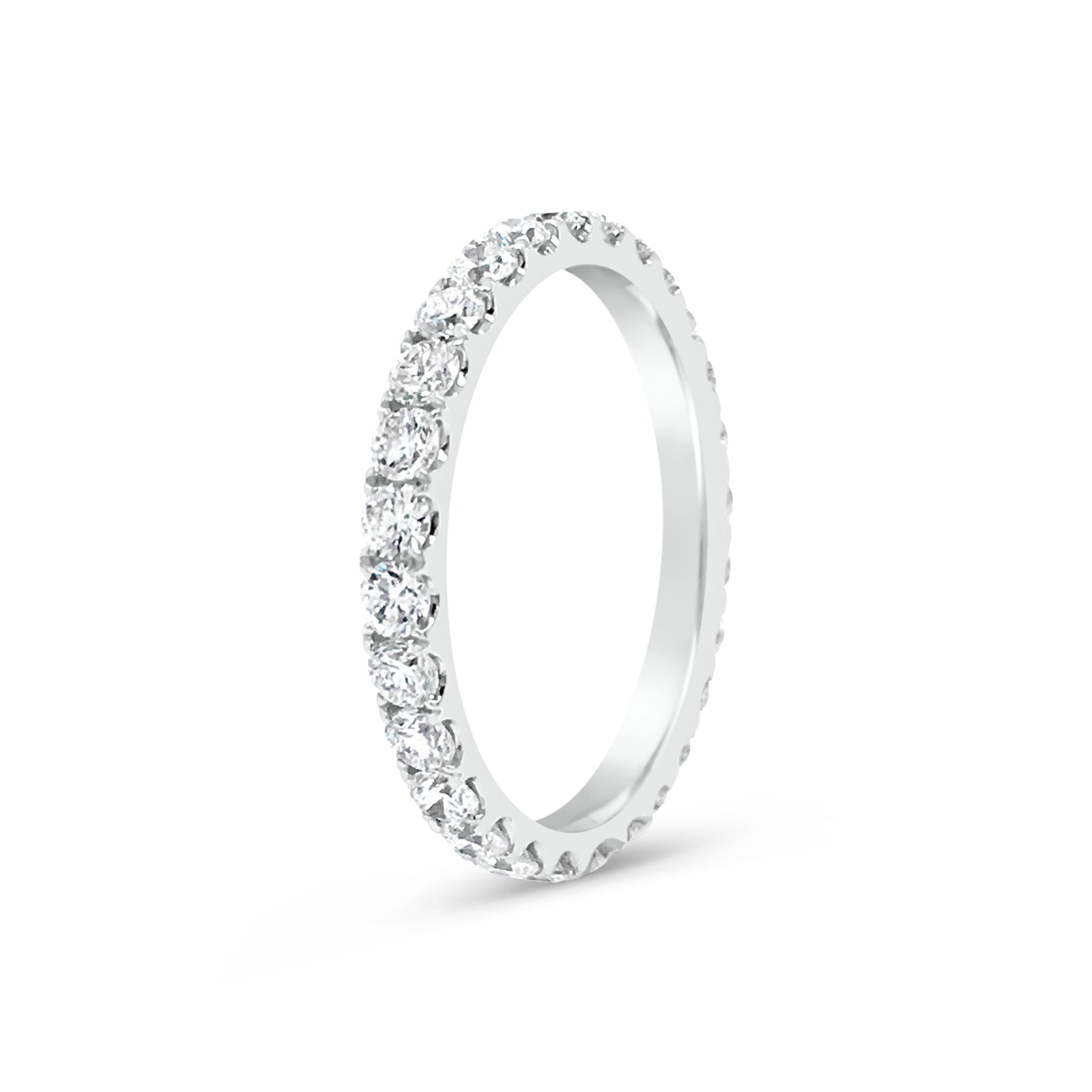 Simple Four Prong-Set Diamond Band  -18k gold weighing 2.52 grams  -26 round diamonds weighing 1.26 carats