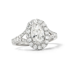 Oval Shaped Diamond Halo Engagement Ring  -18k gold, 3.82 grams  -38 round shared prong-set diamonds .79 carats