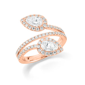 Diamond Pear Shape Bypass Ring  -18k gold, 4.99 grams  -70 round four prong-set diamonds .63 carats  -2 pear shape prong-set brilliant diamonds 1.10 carats.