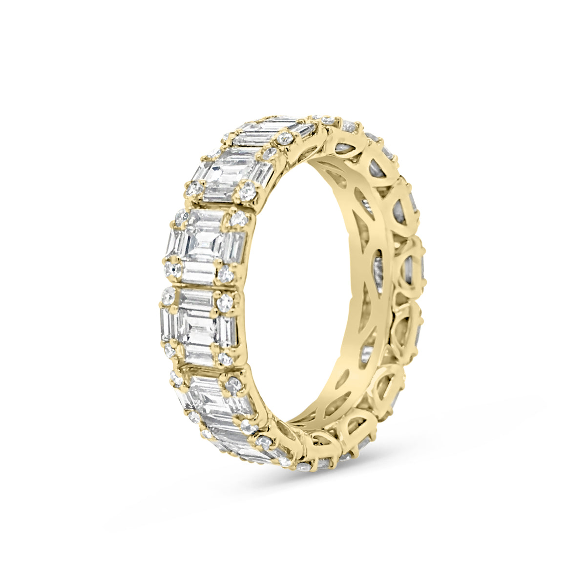 Illusion set Baguette & Round Eternity Ring  -18k gold weighing 4.16 grams  -56 round diamonds weighing .31 carats  -70 straight baguettes weighing 2.59 carats