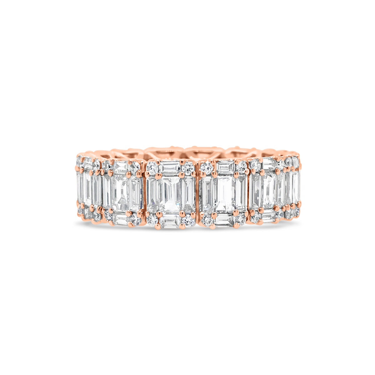 Illusion set Baguette & Round Eternity Ring  -18k gold weighing 4.16 grams  -56 round diamonds weighing .31 carats  -70 straight baguettes weighing 2.59 carats
