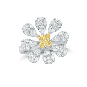 Female Model Wearing Blossoming Diamond Flower Ring  Center radiant cut diamond weighs .76cts. GIA report # 61737737614.  Size width 20.3 millimeters.