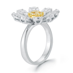Blossoming Diamond Flower Ring  Center radiant cut diamond weighs .76cts. GIA report # 61737737614.  Size width 20.3 millimeters.
