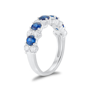 Blue sapphire & diamond alternate ring -18k gold weighing 3.49 grams -12 round shared prong-set brilliant diamonds totaling .96 carats -5 shared prong-set sapphires totaling 1.21 carats.