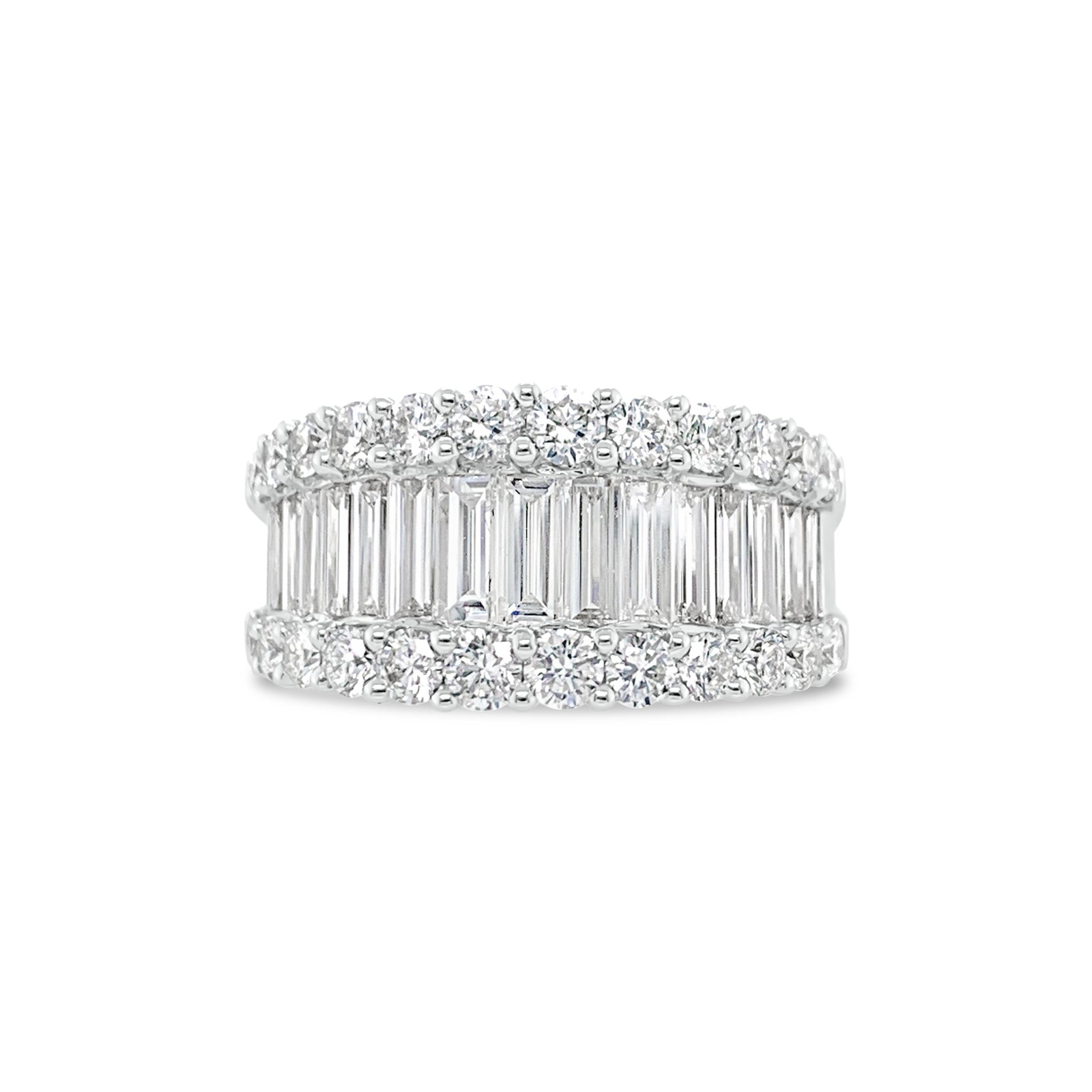 Baguette & Round Diamond Wedding Band   -18K gold weighing 9.73 grams   -15 slim baguettes totaling 1.52 carats   -24 round diamonds totaling 1.31 carats