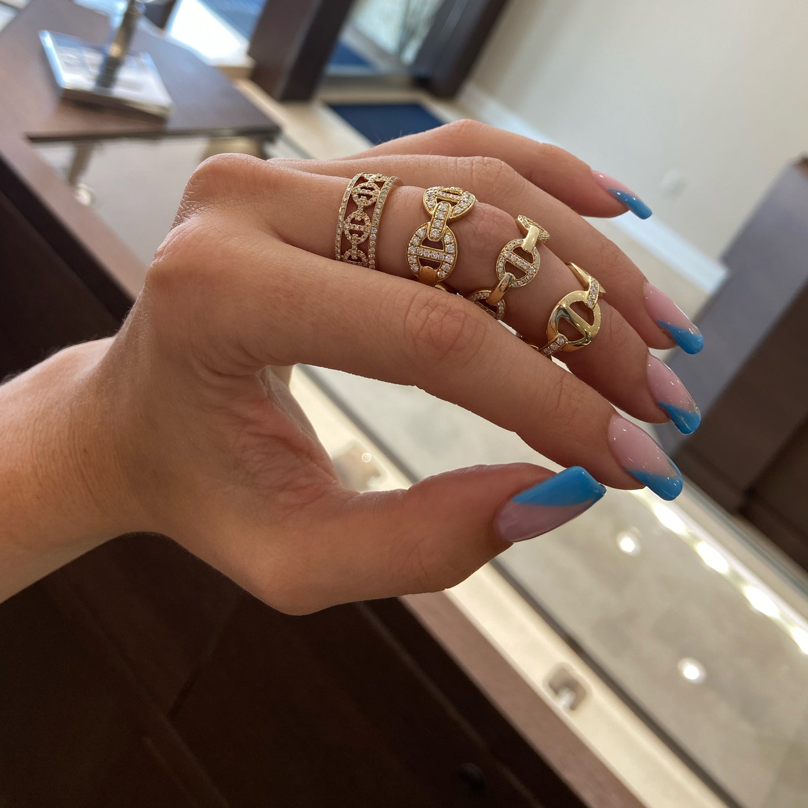 Diamond Chain Link Ring  14k gold, 5.49 grams, 105 round shared prong-set diamonds .46 carats.  Size width 8 millimeters.