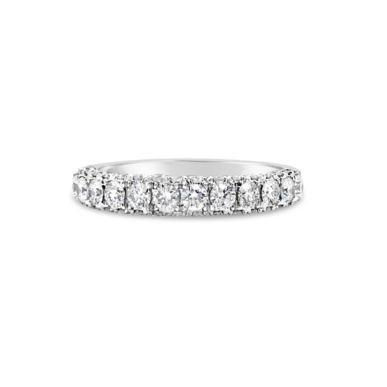 Single Row Diamond Four Prong-Set Diamond Wedding Band -18k gold weighing 3.78 grams  -49 round diamonds weighing 1.10 diamonds
