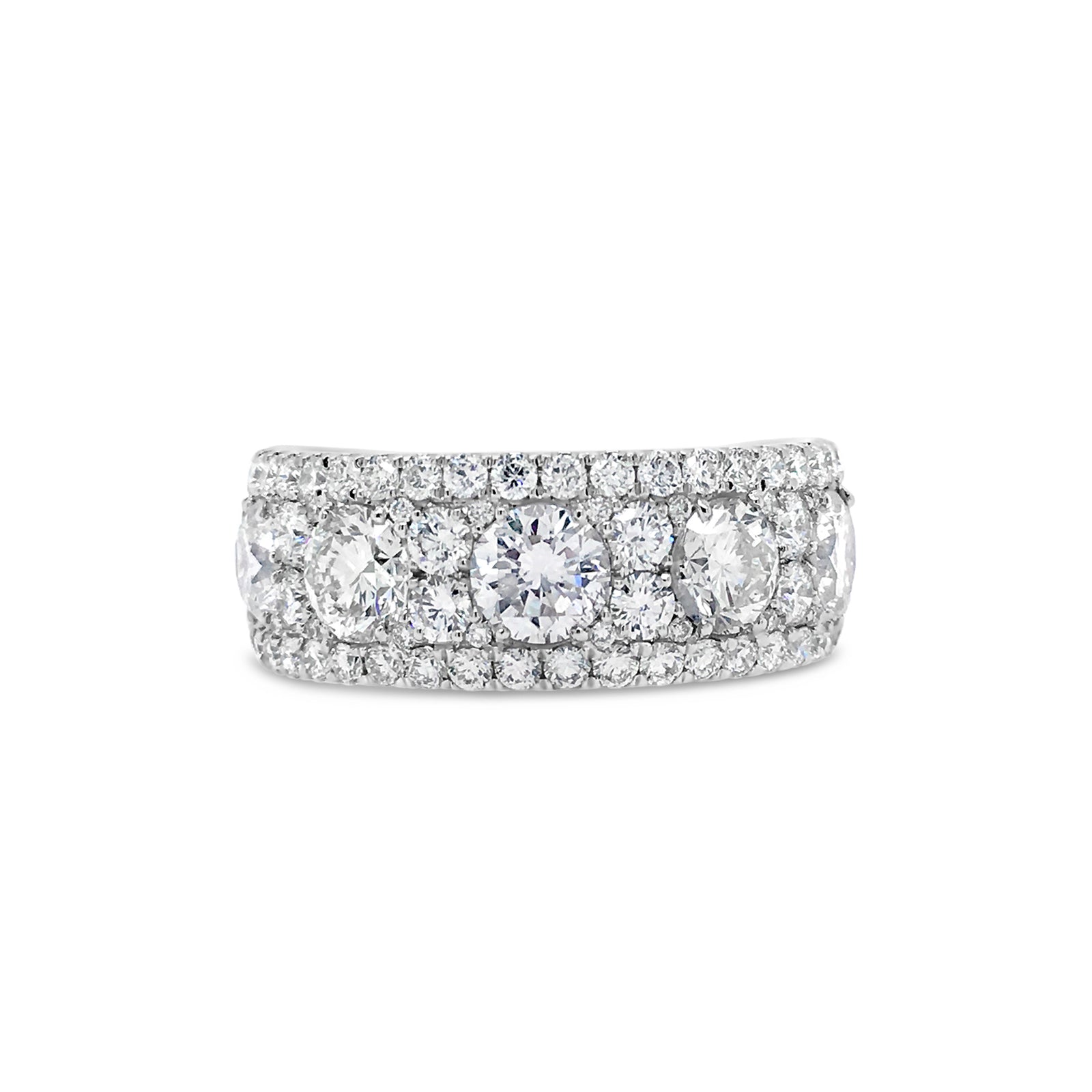 Diamond Cluster Band Ring  -18k gold weighing 7.7 grams  -76 round four prong-set diamonds weighing 1.46 carats   -5 round four prong-set diamonds weighing 2.16 carats 