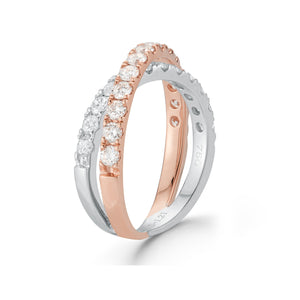Two-tone Interlock Diamond Ring  18k gold, 4.06 grams, 26 round shared prong-set brilliant diamonds 1.21 carats.  Size width 6.3 millimeters.