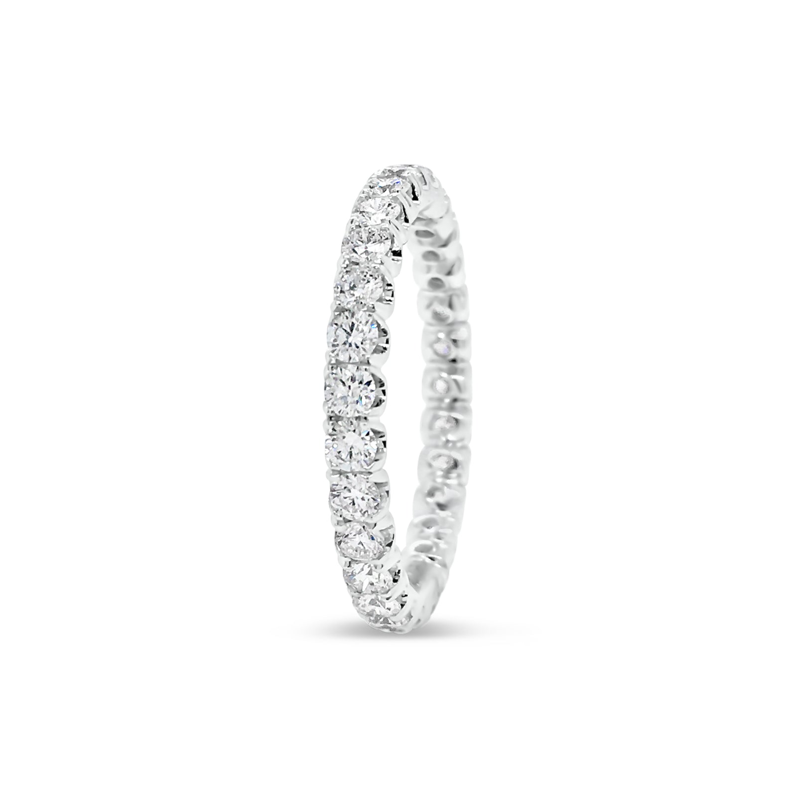 Four Prong-Set Diamond Eternity Wedding Band  -18k gold weighing 2.04 grams  -29 round diamonds weighing 1.11 carats