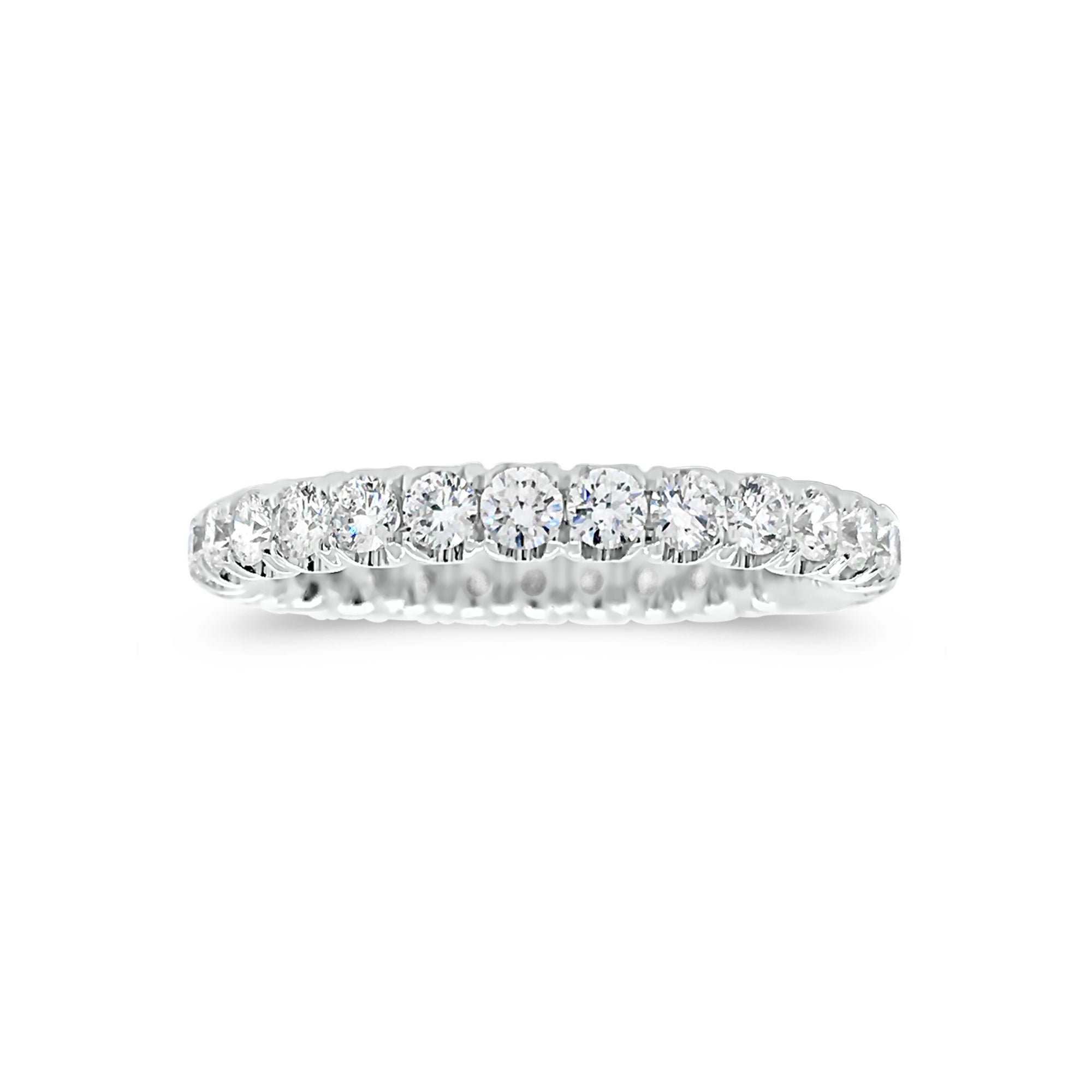 Four Prong-Set Diamond Eternity Wedding Band  -18k gold weighing 2.04 grams  -29 round diamonds weighing 1.11 carats