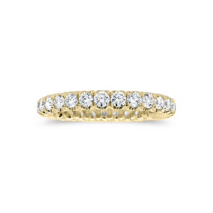 Four Prong-Set Diamond Eternity Wedding Band  -18k gold weighing 2.04 grams  -29 round diamonds weighing 1.11 carats