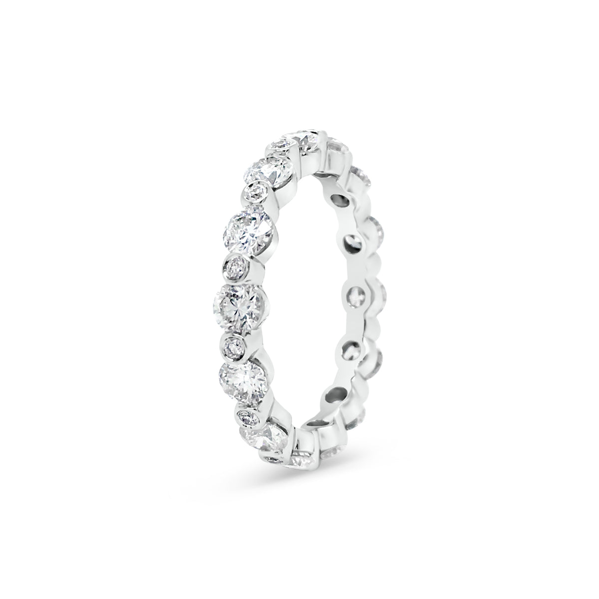 Single Prong Diamond Eternity Ring  -18k gold weighing 2.72 grams  -14 round bezel-set diamonds weighing 1.81 carats  -14 round bezel-set diamonds weighing .14 carats
