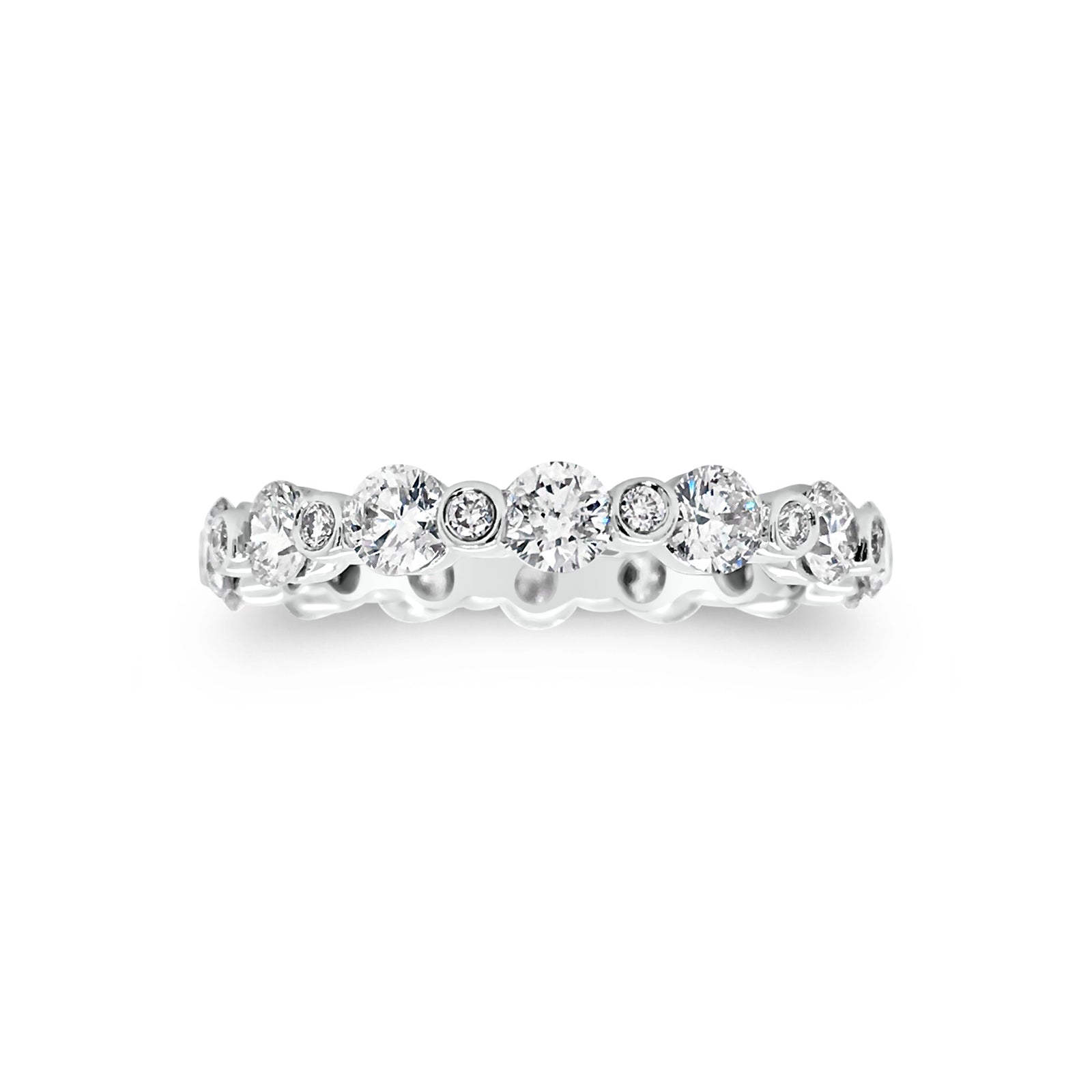 Single Prong Diamond Eternity Ring  -18k gold weighing 2.72 grams  -14 round bezel-set diamonds weighing 1.81 carats  -14 round bezel-set diamonds weighing .14 carats