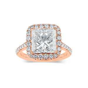 Princess-Cut Diamond Halo Engagement Ring  -18k gold weighing 5.7 grams  -40 round diamonds weighing .83 carats