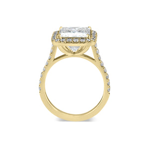 Princess-Cut Diamond Halo Engagement Ring  -18k gold weighing 5.7 grams  -40 round diamonds weighing .83 carats