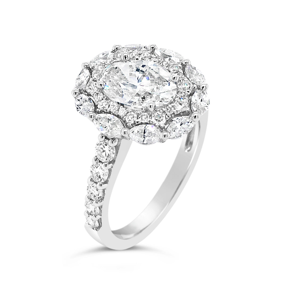 Antique Diamond Engagement Ring  -18k gold weighing 3.51 grams  -10 marquise diamonds weighing .49 carats  -32 round diamonds weighing .48 carats with  -1 oval brilliant cut diamond weighing 1.22 carats with J color I1