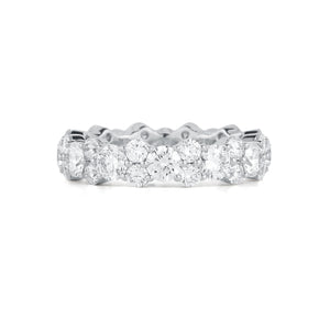 Staggered Diamond Eternity Band  -18k gold weighing 4.14 grams  -12 round diamonds weighing 2.40 carats  -24 round diamonds weighing 1.38 carats