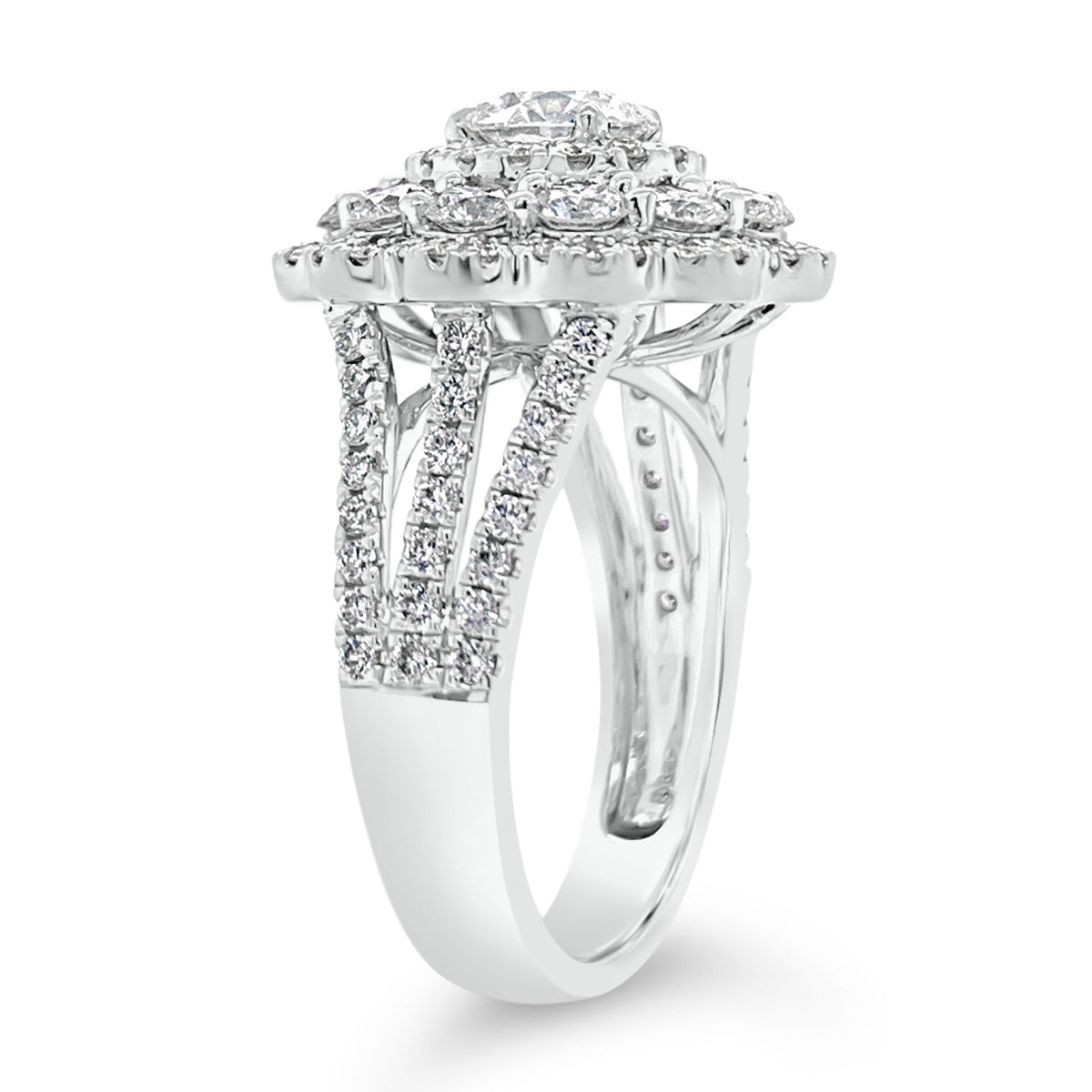 Diamond Carnation Ring  -18K gold weighing 7.21 grams  -0.88 ct round brilliant-cut diamond (GIA-graded I color, I1 clarity)  -12 round diamonds totaling 1.07 carats  -110 round diamonds totaling 0.73 carats