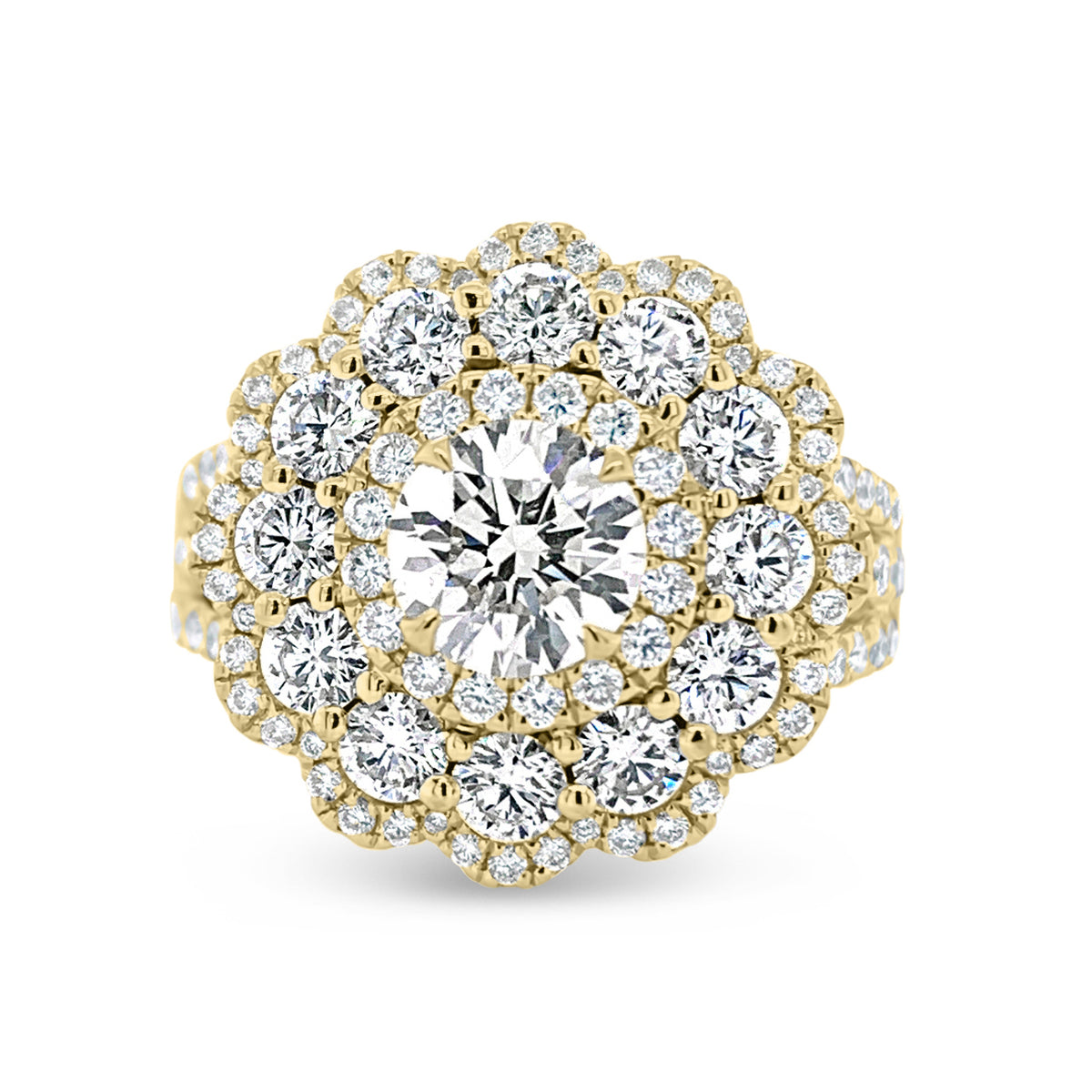 Diamond Carnation Ring  -18K gold weighing 7.21 grams  -0.88 ct round brilliant-cut diamond (GIA-graded I color, I1 clarity)  -12 round diamonds totaling 1.07 carats  -110 round diamonds totaling 0.73 carats