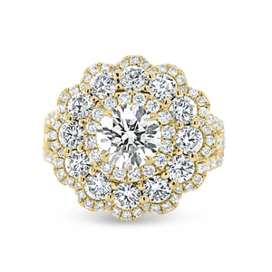 Diamond Carnation Ring  -18K gold weighing 7.21 grams  -0.88 ct round brilliant-cut diamond (GIA-graded I color, I1 clarity)  -12 round diamonds totaling 1.07 carats  -110 round diamonds totaling 0.73 carats