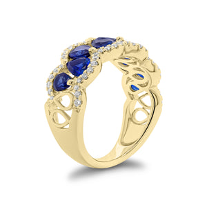 Sapphire and Diamond Scalloped Ring - 18K gold weighing 5.59 grams  - 60 round diamonds weighing 0.30 carats  - 9 pear-shaped sapphires weighing 2.39 carats