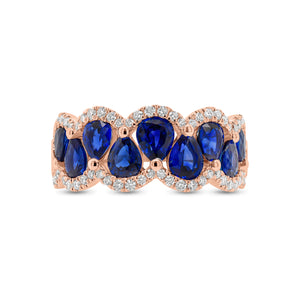 Sapphire and Diamond Scalloped Ring - 18K gold weighing 5.59 grams  - 60 round diamonds weighing 0.30 carats  - 9 pear-shaped sapphires weighing 2.39 carats