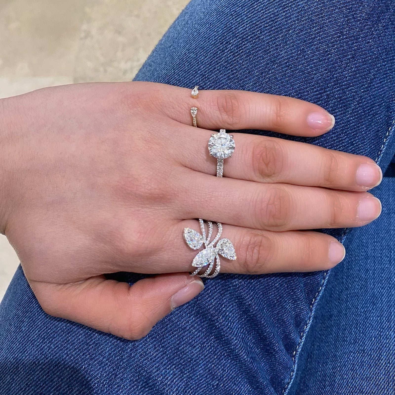 Pear and Marquise-Shaped Diamond Statement Ring - 18K gold weighing 6.24 grams  - 117 round diamonds totaling 0.72 carats  - 2 pear-shaped diamonds totaling 0.46 carats  - 0.28 ct marquise-shaped diamonds