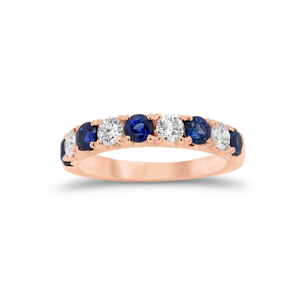 Sapphire & Diamond Wedding Band  -18K gold weighing 3.89 grams  - 5 sapphires totaling 1.09 carats  - 4 round diamonds totaling 0.49 carats
