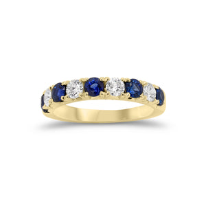 Sapphire & Diamond Wedding Band  -18K gold weighing 3.89 grams  - 5 sapphires totaling 1.09 carats  - 4 round diamonds totaling 0.49 carats